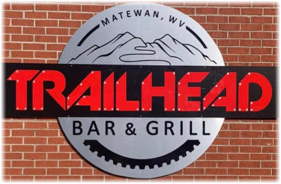 Picture of our logo on the outside of Trailhead Bar and Grill