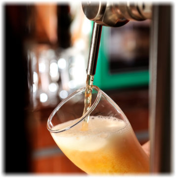 Picture of a beer being poured into a glass at Trailhead Bar and Grill